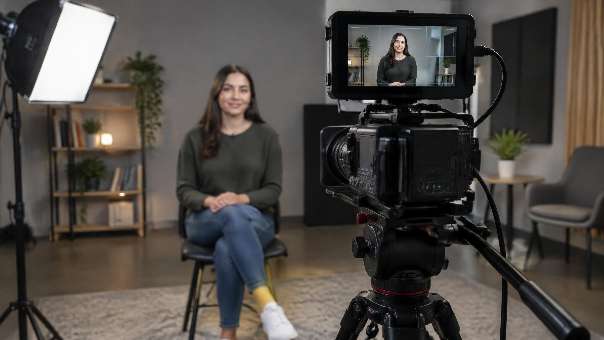 Beginner learning camera framing in a small studio