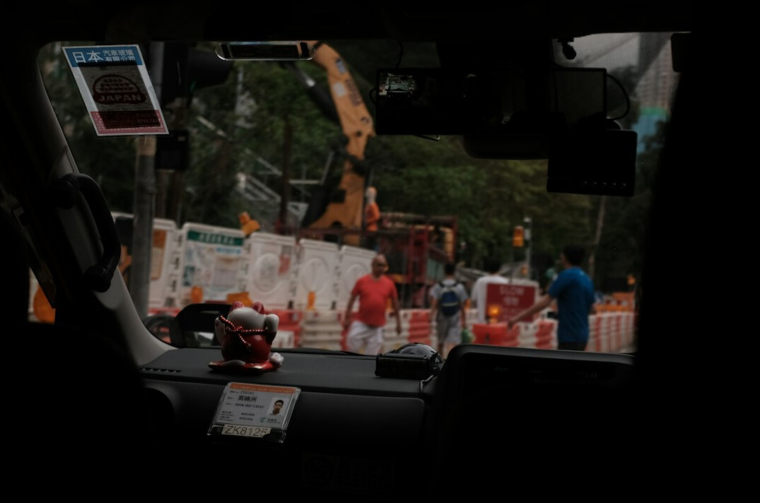 Outside broadcast truck interior with monitors and crew desks
